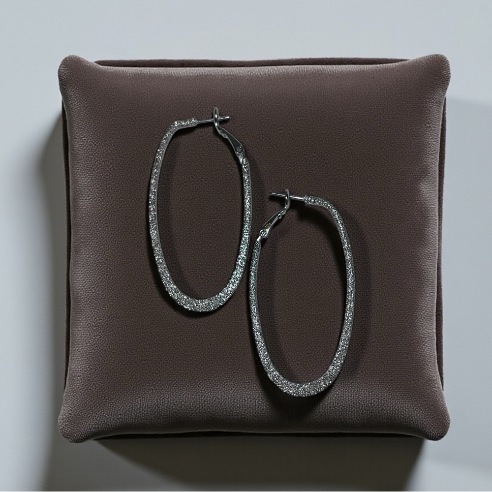 Elegant Oval Silver Hoop Earrings with Glitter